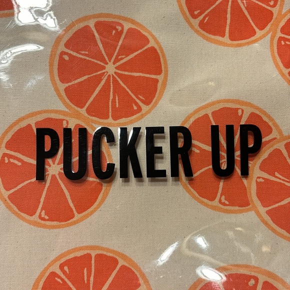 Kate Spade 11” clutch NWT. The only flaw is a small water mark under plastic. - Picture 13 of 16